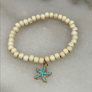 Ivory Beaded Stretch Bracelet with Turquoise Oil Drip Starfish Charm
